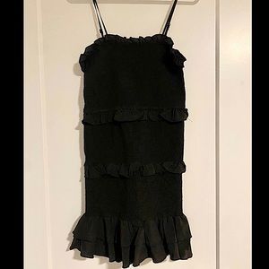 Little black dress with ruffles and ruching